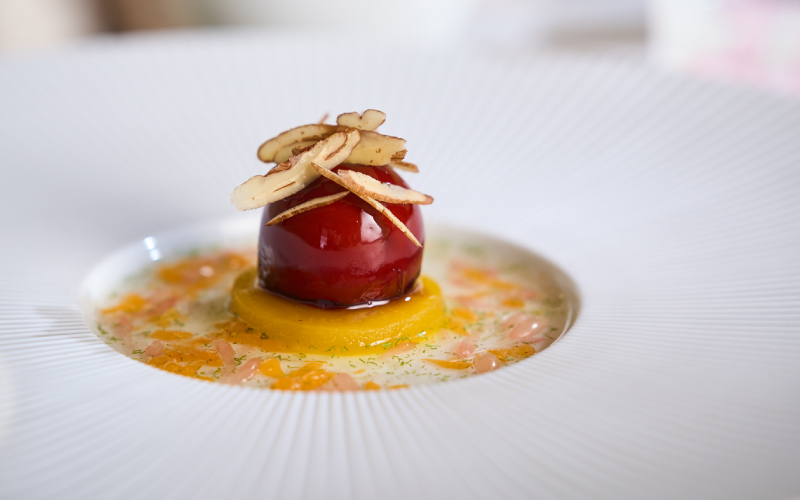Artfully arranged muscat jelly on a flat plate